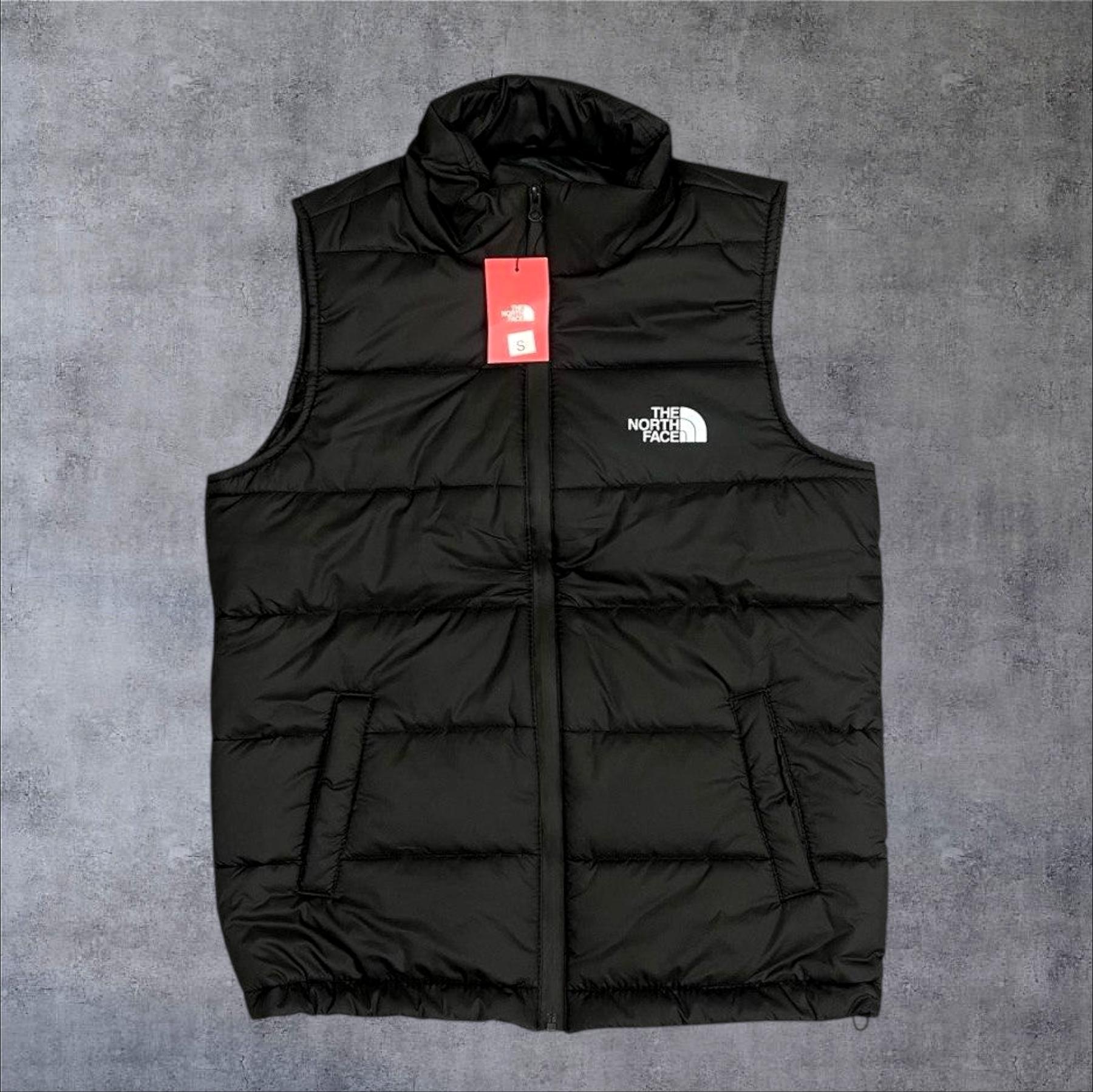 Жилетка The North Face ( колір) чоловіча чорна демісезонна на блискавці на синтепоні прямого крою безрукавка